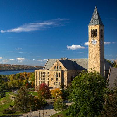 McGraw Tower, Uris Library, Ho Plaza, and Cayuga Lake in fall.