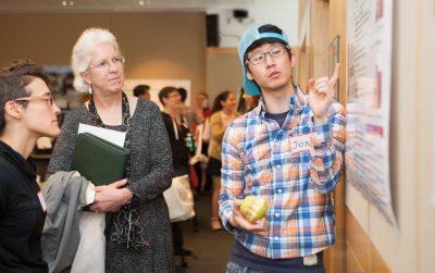 Graduate School Dean Barbara Knuth chats with students at the 2015 Center for the Integration of Research, Teaching, and Learning (CIRTL) Classroom Research and Teaching Symposium.