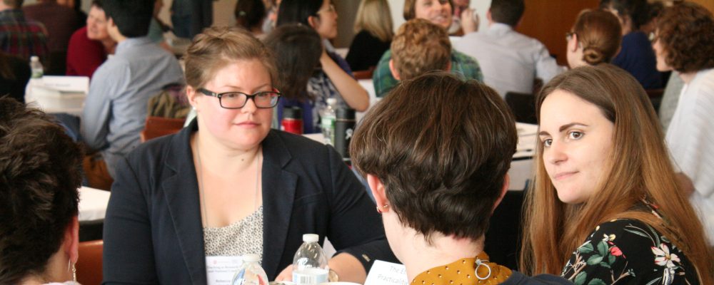 Rebecca Harrison, Frances Fairbairn, and other graduate students at a 2017 teaching conference