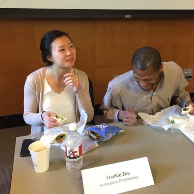 NextGen alumni Frankie Zhu and Jermaine Toney joke around prior to a panel discussion on getting a faculty position