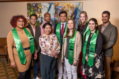 Image of nine new Bouchet Scholars, half of whom have on green stoles